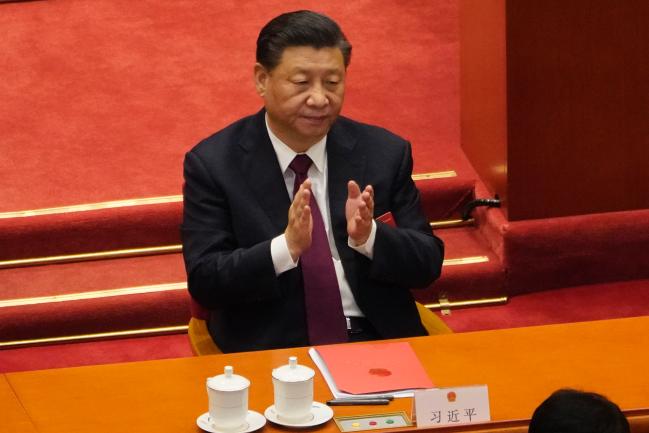 시진핑 중국 국가주석은 앞장서서 지능화 전쟁 전략을 적극적 추진하고 있다. 사진은 지난 11일 베이징 인민대회당에서 열린 전국인민대표대회 전체회의에 참석한 모습.  연합뉴스